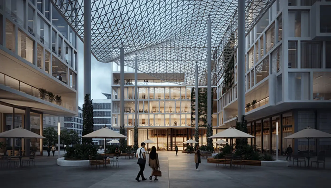 Architectural render of a glass-canopied atrium at dusk, the kind of work Chaos's customers create.